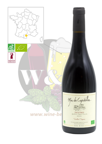 Bottle of AOC Faugères - Mas de Capitelles. This is an organic red wine, made from 80 year old vines. It has dense tannins, with notes of cherry and blackcurrant.